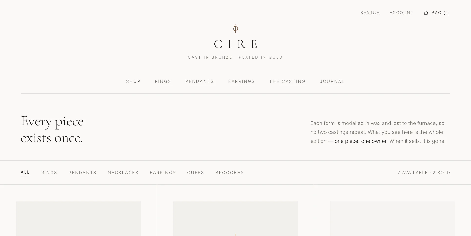 Luxury storefront for gold-plated pieces headlined “Every piece exists once” above a product grid